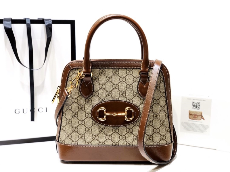 G*u*i top handle bags